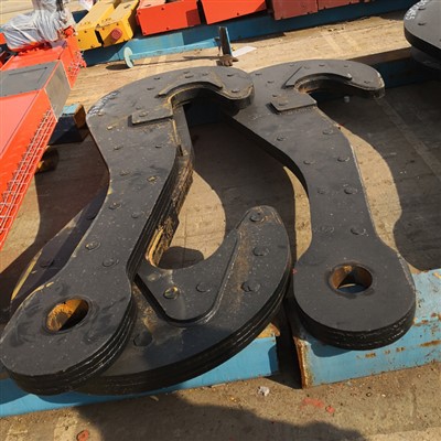 Laminált merőkanál horog